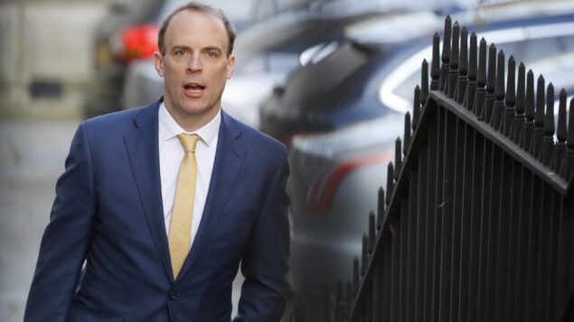 Britain's Foreign Secretary Dominic Raab arrives at Downing street in central London to chair the Government's Covid-19 daily briefing on April 7, 2020. - Raab will take charge of the Government's response to the coronavirus crisis after Britain's Prime Minister Boris Johnson was transferred to intensive care. (Photo by Tolga AKMEN / AFP)