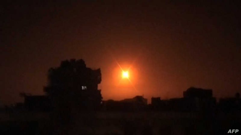 This image grab taken from a video released by the official Syrian Arab News Agency (SANA) on February 6, 2020, shows an explosion following an Israeli air strike on an undisclosed location in Syria. - Israeli air strikes killed 12 pro-Iran fighters in Syria, a monitor said, the latest in a spate of raids Israel has said targeted Iranian ambitions to develop a military presence on its doorstep. A Syrian army source quoted by state news agency SANA said air defences responded to two waves of Israeli strikes after midnight that targeted the Damascus area and then positions in Daraa and the adjacent province of Quneitra. (Photo by - / SANA / AFP) / == RESTRICTED TO EDITORIAL USE - MANDATORY CREDIT "AFP PHOTO / HO / SANA" - NO MARKETING NO ADVERTISING CAMPAIGNS - DISTRIBUTED AS A SERVICE TO CLIENTS ==