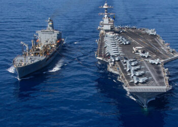 In this image released by the US Department of Defense, the world's largest aircraft carrier USS Gerald R. Ford sails during a fueling-at-sea operation from the replenishment oiler USNS Laramie (L) in the eastern Mediterranean Sea, October 11, 2023. US President Joe Biden dispatched the carrier and its fleet to the region in a show of support for Israel, also warned Hamas-backer Iran to "be careful." US officials said another carrier would soon be available if needed. (Photo by Jacob Mattingly / US Department of Defense / AFP) / RESTRICTED TO EDITORIAL USE - MANDATORY CREDIT "AFP PHOTO /  US Department of Defense/US Navy/Mass Communication Specialist 2nd Class Jacob Mattingly" - NO MARKETING NO ADVERTISING CAMPAIGNS - DISTRIBUTED AS A SERVICE TO CLIENTS