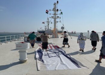 People tour the deck of the Galaxy Leader commercial ship, seized by Yemen's Houthis last month, off the coast of al-Salif, Yemen December 5, 2023. REUTERS/Khaled Abdullah