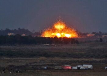 TOPSHOT - A picture taken on July 24, 2018 from the Tal Saki hill in the Israeli-annexed Golan Heights shows an explosion caused by aerial bombardment across the border in Syria, during air strikes backing a Syrian-government-led offensive in the southwestern province of Daraa. (Photo by JALAA MAREY / AFP)        (Photo credit should read JALAA MAREY/AFP via Getty Images)