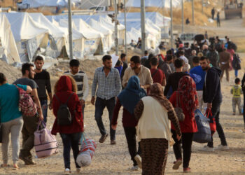 Syrian displaced families, who fled violence after the Turkish offensive in Syria, are seen upon arrival at a refugee camp in Bardarash on the outskirts of Dohuk, Iraq October 25, 2019. REUTERS/Ari Jalal