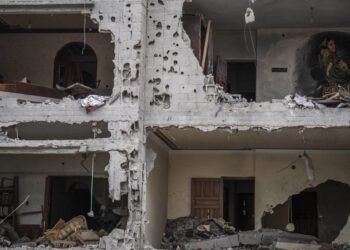 A mural is displayed inside a house destroyed in recent fighting with Israel in Deir al-Balah, central Gaza Strip, Thursday, June 8, 2023. Residents have set up murals and displays of Israeli missiles and fragments in an exhibition aimed at drawing attention to the damage to their homes. Israel attacked hundreds of targets, while Islamic Jihad militants fired over 1,000 rockets into Israel during five days of fighting last month. (AP Photo/Fatima Shbair)