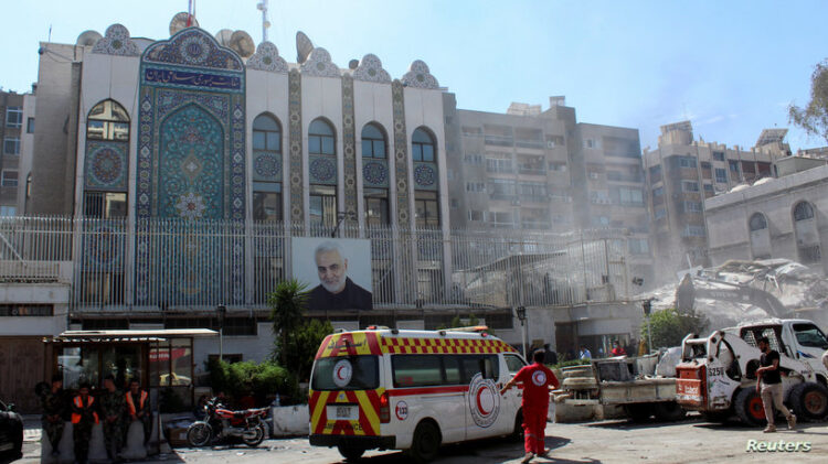 An ambulance is parked outside the Iranian embassy after a suspected Israeli strike on Monday on Iran's consulate, adjacent to the main Iranian embassy building, which Iran said had killed seven military personnel including two key figures in the Quds Force, in the Syrian capital Damascus, Syria April 2, 2024. REUTERS/Firas Makdesi