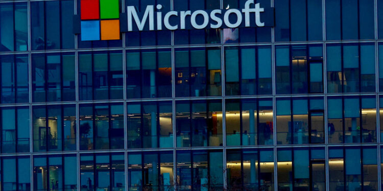 FILE PHOTO: FILE PHOTO: A view shows a Microsoft logo at Microsoft offices in Issy-les-Moulineaux near Paris, France, February 9, 2024. REUTERS/Gonzalo Fuentes/File Photo/File Photo