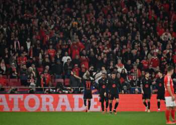 LISBON, PORTUGAL - MARCH 5: Raphinha of FC Barcelona celebrates after scoring his sides first goal during the UEFA Champions League 2024/25 UEFA Champions League 2024/25 Round of 16 first Lleg match between SL Benfica and FC Barcelona at  on March 5, 2025 in Lisbon, Portugal. (Photo by MB Media/Getty Images)
